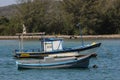 Wooden boats anchored in connection channel with the sea