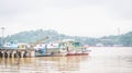 Wooden boats docked in Mahakam river Royalty Free Stock Photo