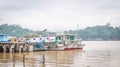 Wooden boats docked in Mahakam river Royalty Free Stock Photo