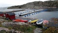 Wooden boats on the fishing harbor on the ocean coast in southern Sweden Royalty Free Stock Photo