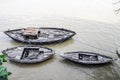 Wooden boats on a ganges river in Varanasi, India. Royalty Free Stock Photo