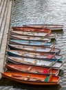 Wooden boats for hire moored on the River Thames in Richmond Royalty Free Stock Photo