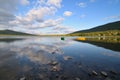 Wooden boats on the mountain lake Royalty Free Stock Photo