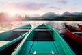 Wooden boats at the mountain lake at sunny morning. Royalty Free Stock Photo