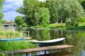 Wooden boats near the bank of the Trubezh River in summer. Royalty Free Stock Photo