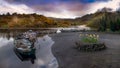 Wooden boats in a row on a lake. Ireland. Royalty Free Stock Photo