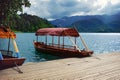 Typical wooden boats, lake Bled, Slovenia, Europe Royalty Free Stock Photo