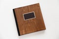Wooden book with metal shild Royalty Free Stock Photo