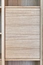 Wooden bookshelves. Wooden bookcases and wall panels made of oak veneered MDF