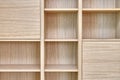 Wooden bookshelves. Wooden bookcases and wall panels made of oak veneered MDF