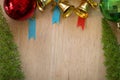 Wooden board with Decorated Christmas tree, colorful ornaments and copyspace design for make background Royalty Free Stock Photo