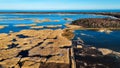 Wooden Bords Trail Through the Kaniera Lake Reeds Aerial Spring Shot Lapmezciems, Latvia. Royalty Free Stock Photo