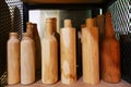 wooden bottles on shelf for pattern and design