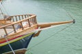 Bow on wooden ship in the sea, Santorini, Greece