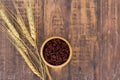 Wooden bowl with brown rice ready to eat. Deep Purple rice, Royalty Free Stock Photo