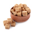 Wooden bowl and brown sugar cubes isolated on white Royalty Free Stock Photo