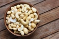 Wooden bowl of cashew nuts from above. Royalty Free Stock Photo