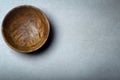 Wooden bowl on a concrete stone surface. Texture and texture of wood and concrete Royalty Free Stock Photo