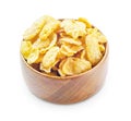 Wooden bowl with cornflakes isolated on white background Royalty Free Stock Photo