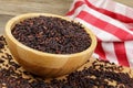 Wooden Bowl of delicious and healthy Black Rice Royalty Free Stock Photo