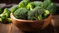 Wooden bowl filled with broccoli florets