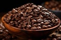 a wooden bowl filled with coffee beans Royalty Free Stock Photo