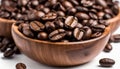 A wooden bowl filled with coffee beans Royalty Free Stock Photo