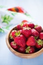 Wooden bowl filled with fresh ripe strawberries Royalty Free Stock Photo