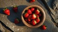 Sunlit Juicy Strawberries in Rustic Wooden Bowl, Summer Harvest Royalty Free Stock Photo