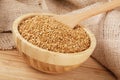 Wooden bowl filled with healthy and delicious Roasted Flax Seeds