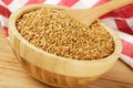 Wooden bowl filled with healthy and delicious Roasted Flax Seeds