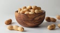 Wooden bowl filled peanuts table Royalty Free Stock Photo