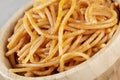 Wooden bowl filled with Spaghetti with Marinara Sauce Royalty Free Stock Photo