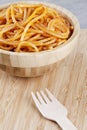 Wooden bowl filled with Spaghetti with Marinara Sauce Royalty Free Stock Photo