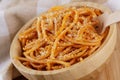 Wooden bowl filled with Spaghetti with Marinara Sauce