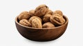 Photo of a wooden bowl filled with walnuts on a white background