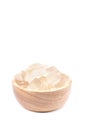 A wooden bowl full of freshly picked Aloe vera plant, peeled and