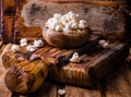 Wooden bowl full of sweet popcorn in wooden vintage bowl on rustic table. Vintage style. Selective focus Royalty Free Stock Photo