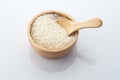 Wooden bowl of jasmine rice grain Royalty Free Stock Photo