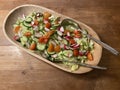 Wooden bowl of mixed green salad Royalty Free Stock Photo