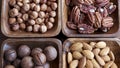 Wooden bowl with mixed nuts on table top view. Healthy food and snack. Walnut, pistachios, almonds, hazelnuts and Royalty Free Stock Photo