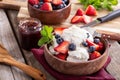 Bowl of Vanilla Ice Cream With Blueberries and Strawberries Royalty Free Stock Photo