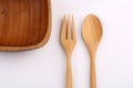 Wooden bowl with wood fork and wooden spoon made by Teak isolate Royalty Free Stock Photo