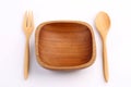 Wooden bowl with wooden fork and wooden spoon made by Teak isola Royalty Free Stock Photo