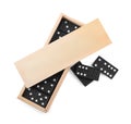 Wooden box with black domino tiles on white background, top view Royalty Free Stock Photo