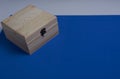 Wooden box on blue mat background for secrets