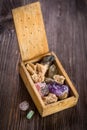 Wooden box with collection of rocks and minerals Royalty Free Stock Photo