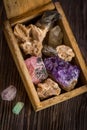 Wooden box with collection of rocks and minerals Royalty Free Stock Photo