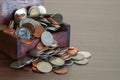 Wooden box full of coins on the wooden table,concept saving mon Royalty Free Stock Photo