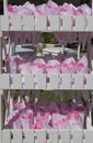 Wooden box full of cornets filled with pink petal roses for wedding Royalty Free Stock Photo